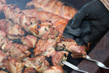 Wall Mural - meat skewers on the barbecue coals