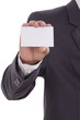© japhoto - Businessman showing blank business card on white background with using path