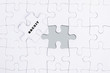 © nelzajamal - Missing white puzzle with BREXIT  word and copyspace area.