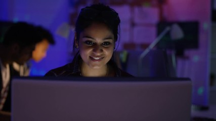 Wall Mural -  Young computer hacker trying to gain access to a computer system