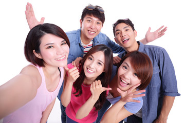 Wall Mural -  teenagers taking pictures by themselves