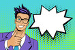 Pop art man. Young hansome man in glasses smiles, winks and shows thumb up . Vector illustration in retro comic style. Vector pop art background.
