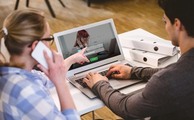 Wall Mural - composite image of login screen with redheaded woman and laptop