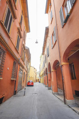 Wall Mural - Bologna, Italy - June, 18, 2016: street in a center of an old town in Bologna, Italy