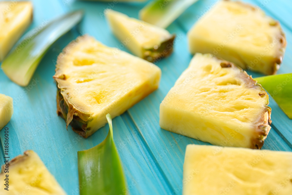 Pineapple slices on blue background