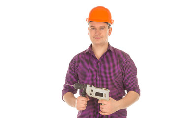 builder in hardhat with drill in hands