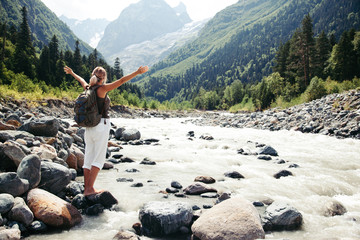 Wall Mural - traveler walking by the river