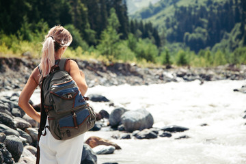Wall Mural - traveler walking by the river