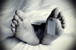 © nito - dead body with a blank toe tag, in monochrome