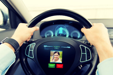 Sticker - close up of man driving car with incoming call