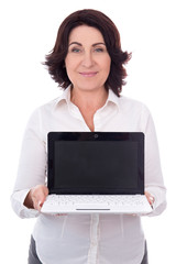 Wall Mural - portrait of beautiful mature business woman showing laptop with