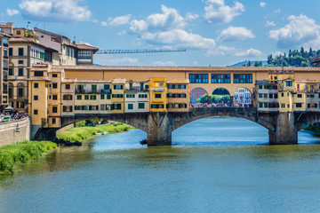 Bridge Ponte Vecchio (1345) on Arno river in Florence, Italy.