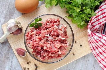 Raw minced beef in a bowl