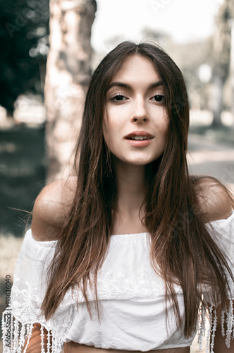 Portrait Of Beautiful Sexy Girls With Dark Hair And Bare Shoulders