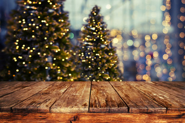 Wall Mural - christmas abstract blur background - light bokeh from xmas tree at night party in winter. vintage co