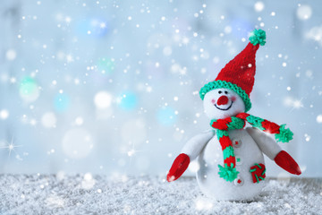 Sticker - Cute snowman on Christmas background. Snow effect