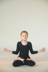 Little girl meditating