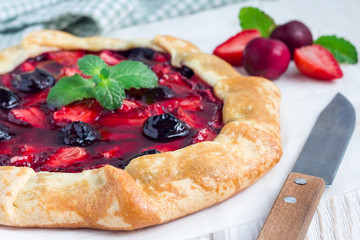 Wall Mural - Cottage cheese dough galette with strawberry and cherry, horizontal