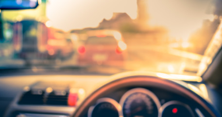 blur image of inside cars with bokeh on day time .