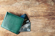 © Africa Studio - Credit cards in leather wallet on wooden background