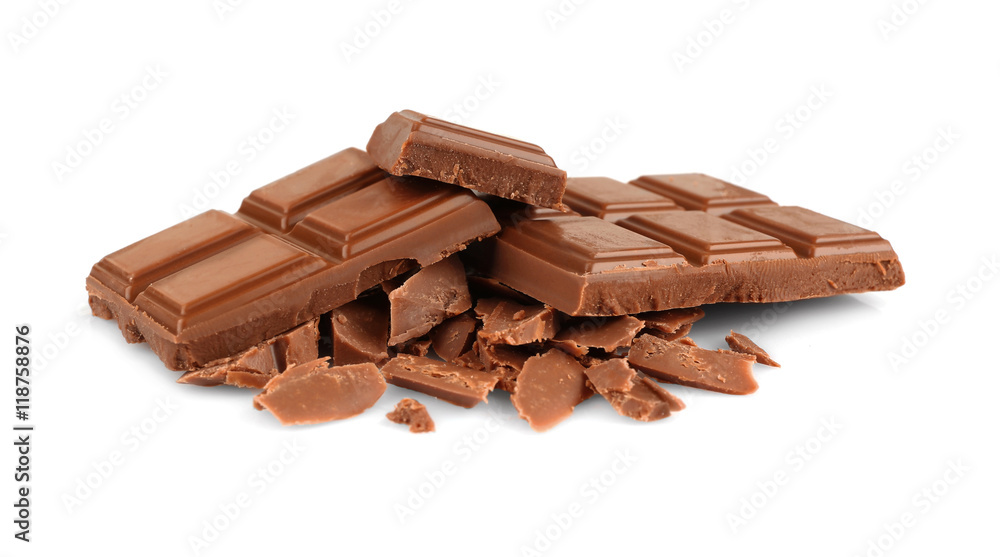 Pile of milk chocolate tiles isolated on white