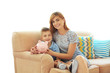 © Africa Studio - Savings concept. Mother and little boy sitting on sofa with piggy bank