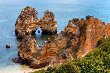Wall Mural - Arch of cliffs on Praia do Camilo beach, Algarve, Portugal