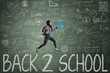 © Creativa Images - Female student and text of Back to School
