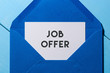 Job offer in blue envelope. Hiring and employment concept background