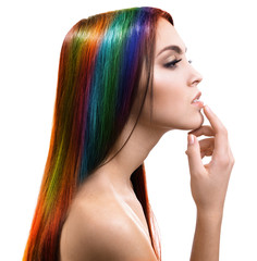 Wall Mural - Beautiful young woman with colorful hair on white background