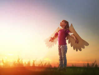 Wall Mural - Kid with the wings of a bird