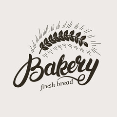 Wall Mural - Bakery. Hand written lettering logo with ear of wheat. Typography badge, label, emblem. Template logotype. Vector illustration.