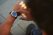 © kegfire - Black Male hand with Smart Watch on wrist