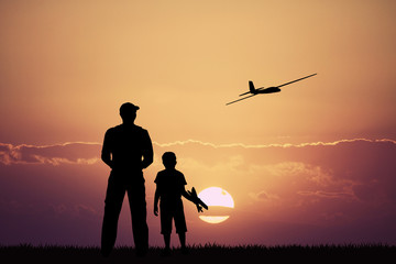 Wall Mural - remote controlled airplanes at sunset