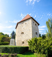 Taylors Bastion Tower And The Statue Of Baba Novac Romanian Hero. A Medieval Construction Built For Defence Purpose In Cluj-Napoca City, Transylvania Region Of Romania In Europe