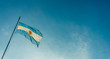 Argentina flag waving against blue sky on a sunny day 
