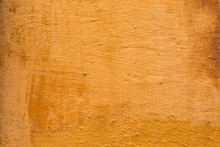 Background Texture Of A Terra Cotta Colored Wall