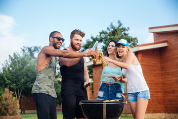 Wall Mural - Happy teens having fun at the picnic area