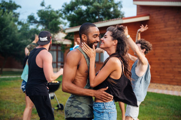 Wall Mural - Happy teens dancing and having fun at the picnic area