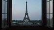 unusual view of the eiffel tower seen from a window time lapse from night to day sunrise,new day birth over paris 4k