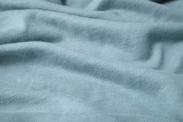 A full page of pale blue sweat fabric texture