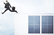 © peshkova - Man jumping off concrete building