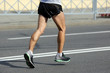 © photosaint - feet running athlete at the distance of a marathon