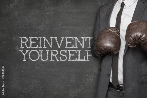 Fotografía Reinvent yourself on blackboard with businessman on side