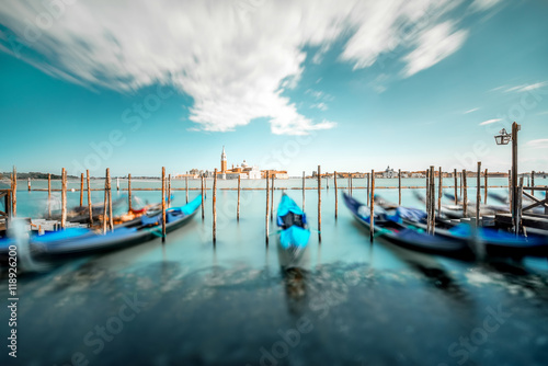 Venice landscape view on San Giorgio Maggiore island with gondolas on the foreground Poster