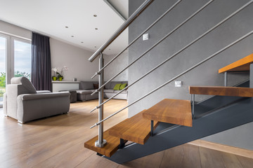 Open plan living room with staircase