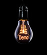 © Duncan Andison - Hanging lightbulb with glowing Demo concept.