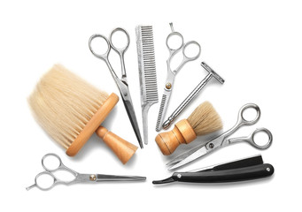 Wall Mural - Vintage tools of barber shop on white background