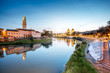 View on Adige river with Verona cathedral and saint George church at the evening in Verona city in Italy