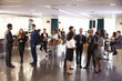 © Monkey Business - Delegates Networking At Conference Drinks Reception
